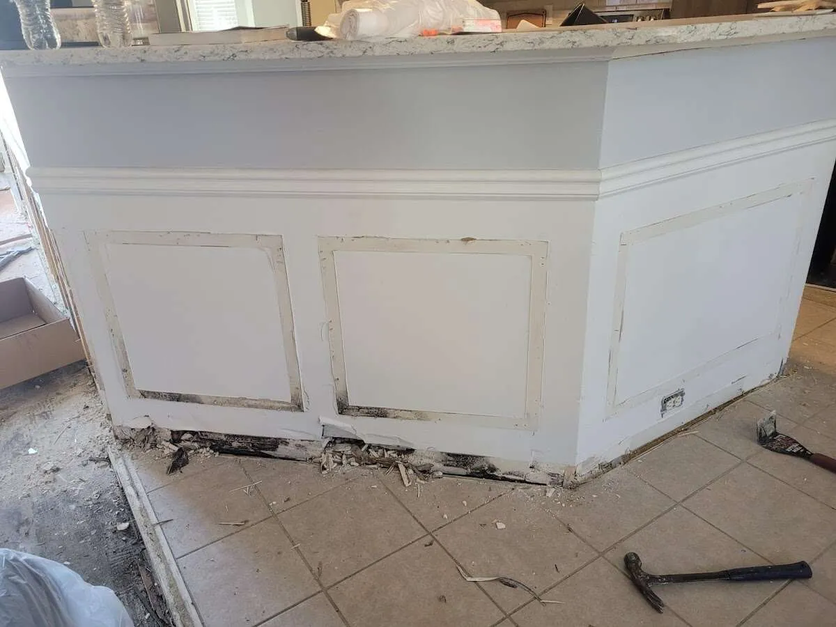Water damage and mold on kitchen during Sewage Cleanup & Sanitation in Capitola
